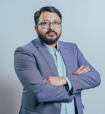 Portrait of Shiv Kher, Associate.